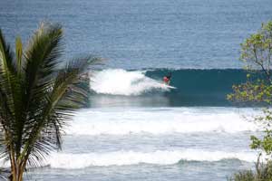 Ivan Camacho surfing La Curva in Playa Hermosa.
