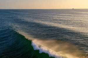 This surf spot can hold huge swells, up to 15 feet.