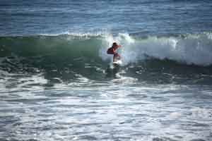 Mikela Castro, a member of the Costa Rican National Surf Team, rides the waves at her home break, Playa Hermosa.