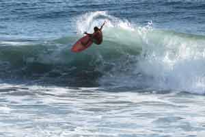 Riding the lip of Costa Rica waves, pure surfer’s paradise.