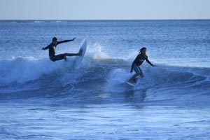 Surfers at Playa Langosta.