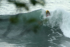 Alejandro Monge, from Piko Surf Shop, surfing at Roca Loca.